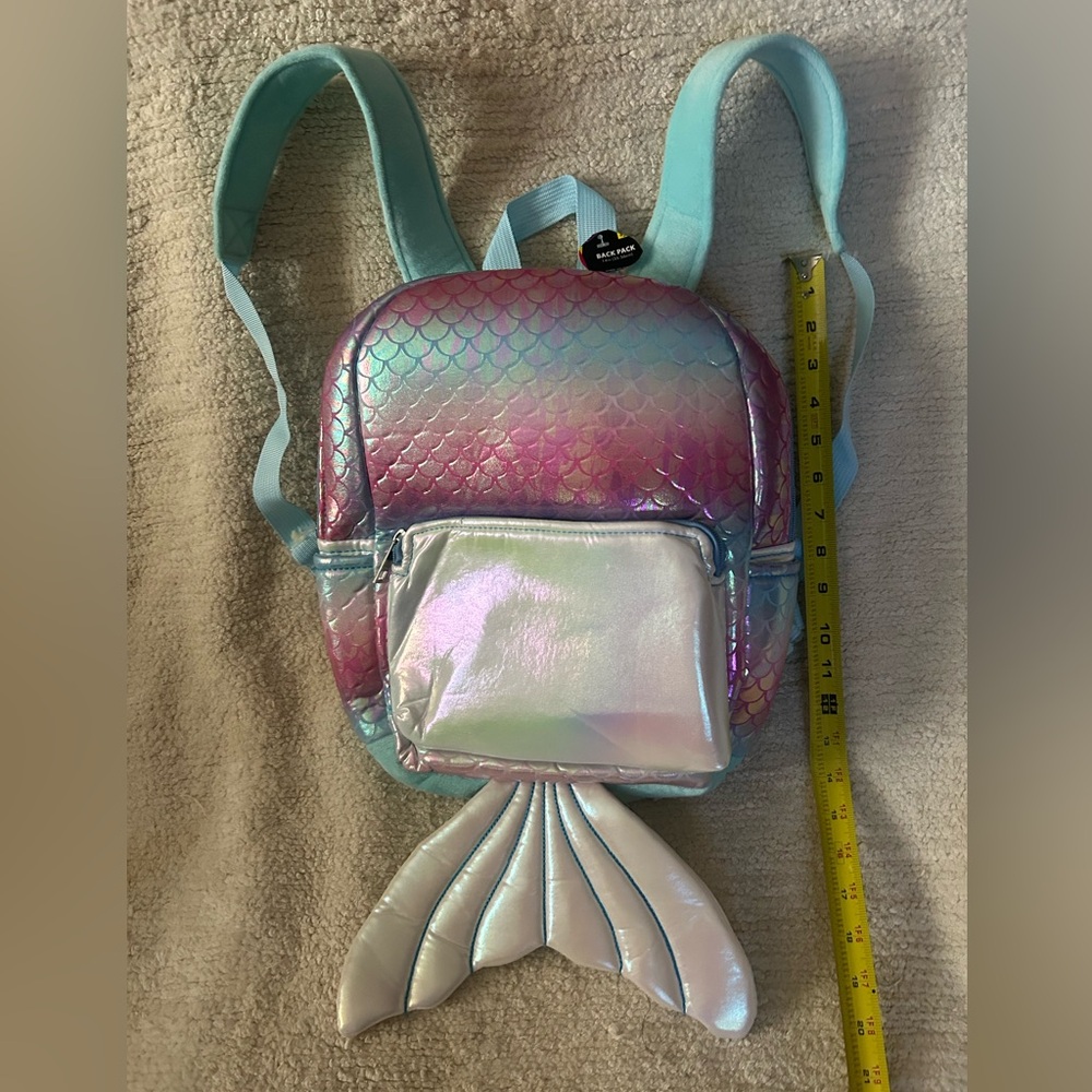 Adorable mermaid backpack. Mulitcolor  mermaid fabric with tail. New